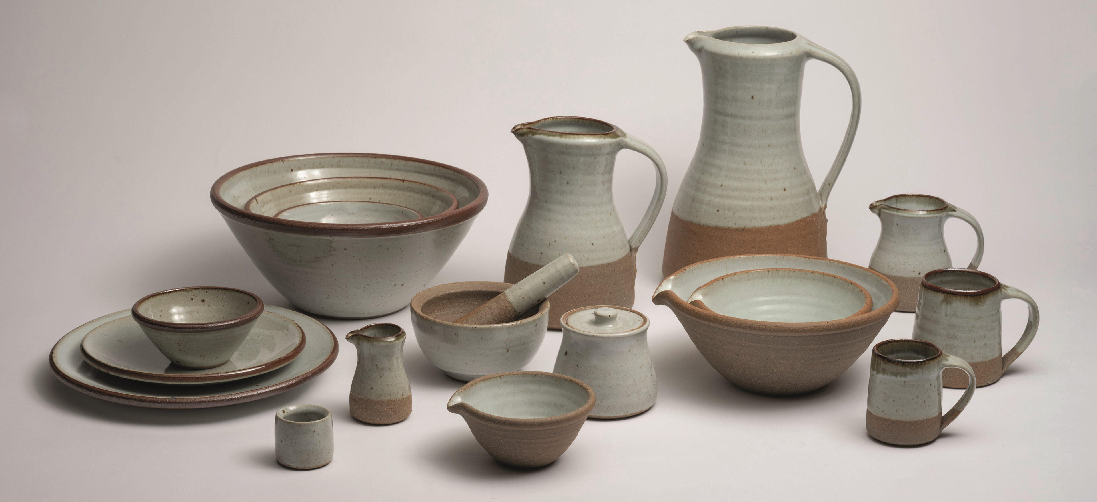 Leach pottery from St. Ives on a grey background.