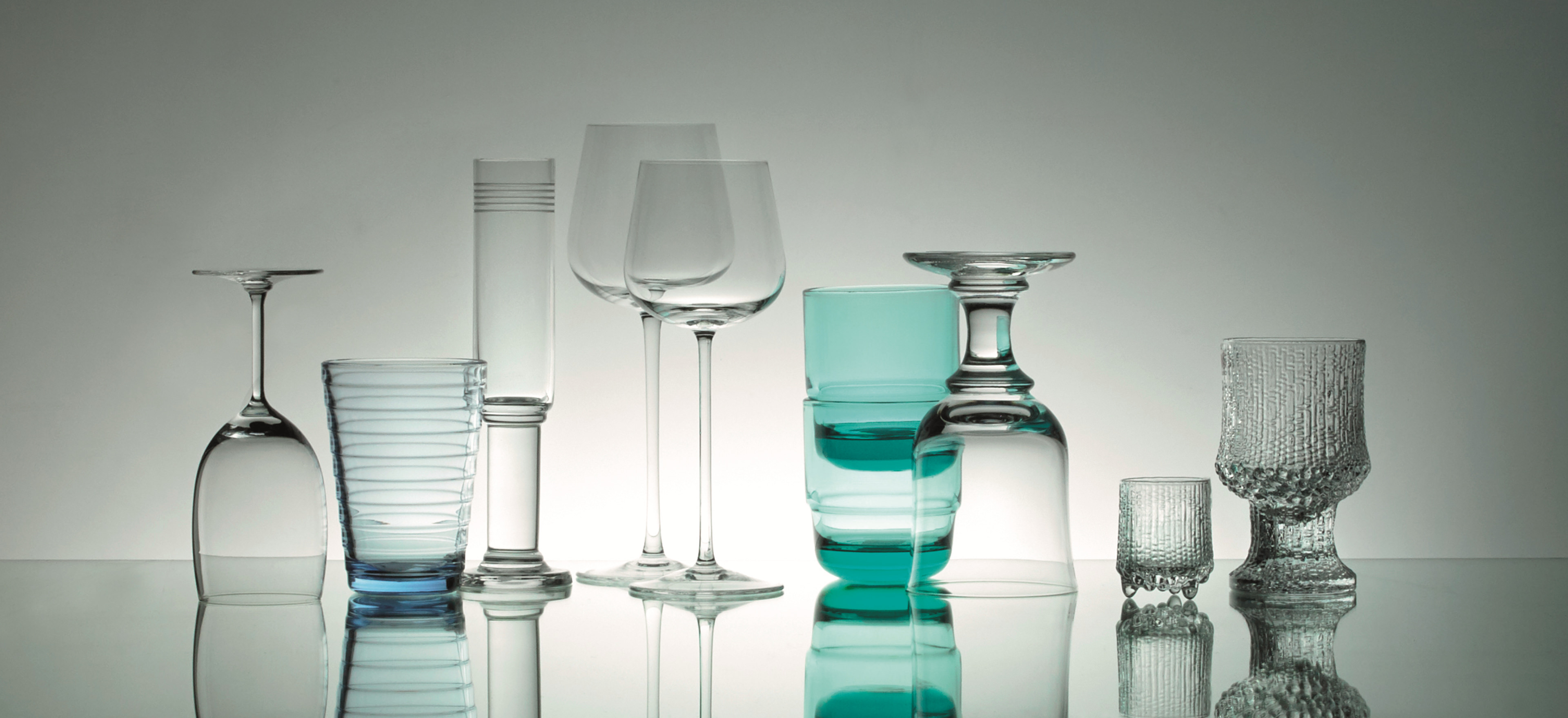 Various glasses from across our glassware ranges arranged on a grey background.