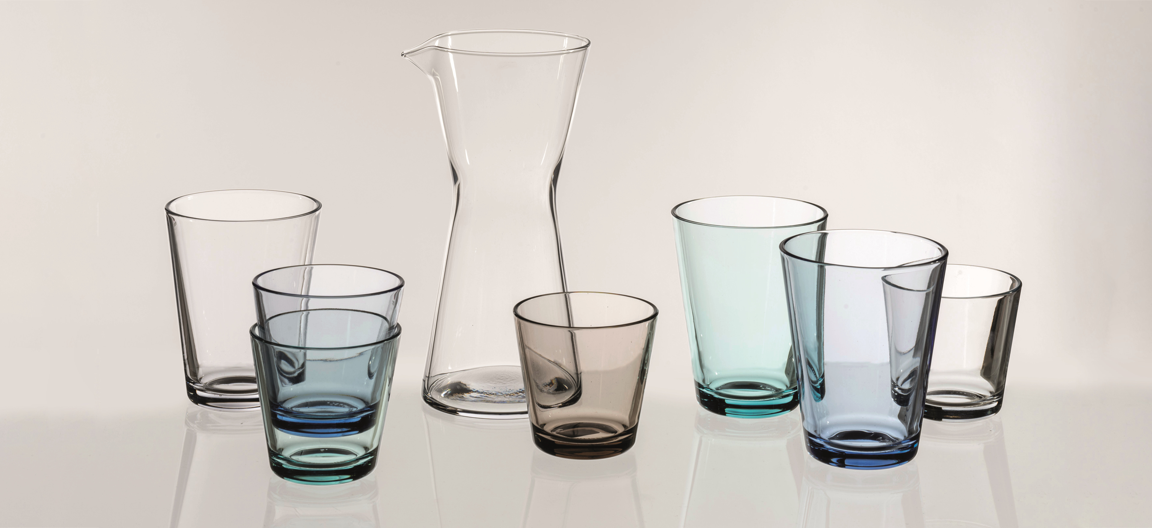 Iittala Kartio glassware on grey background.