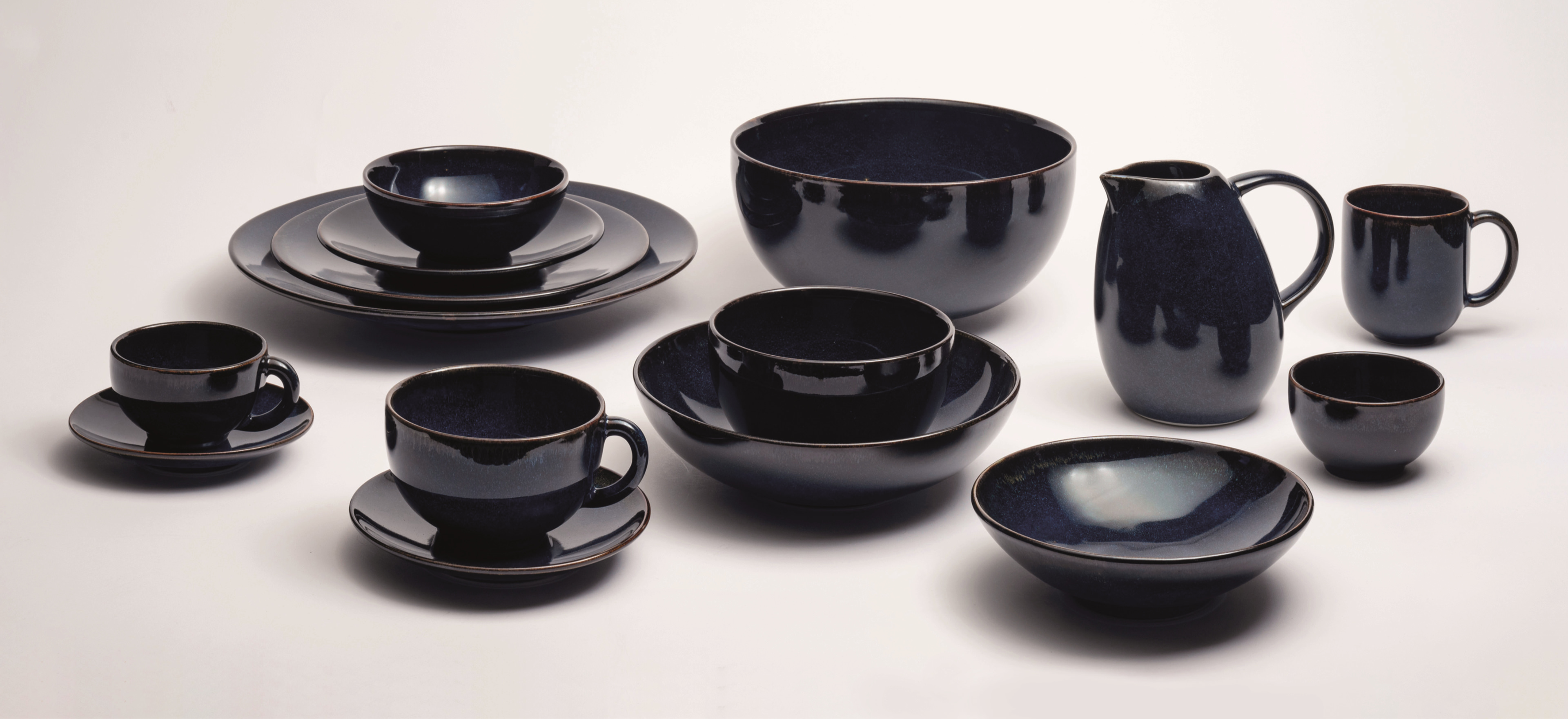 Jars Tourron French pottery on a grey background.