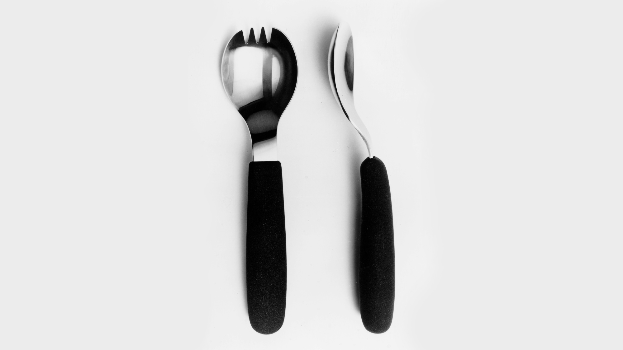 Cutlery for people with a physical disability displayed on a white background.