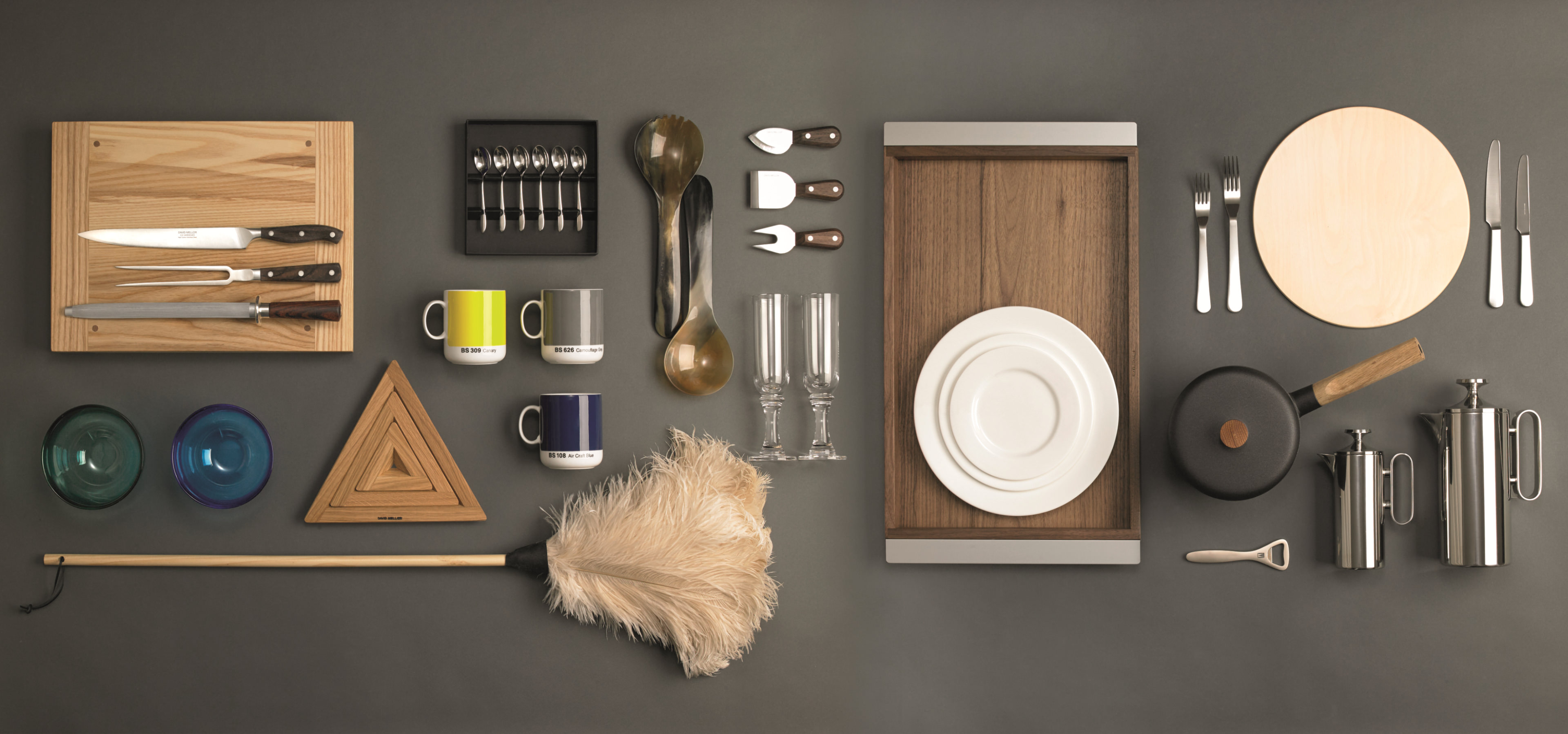 A selection of David Mellor products displayed on a grey background.